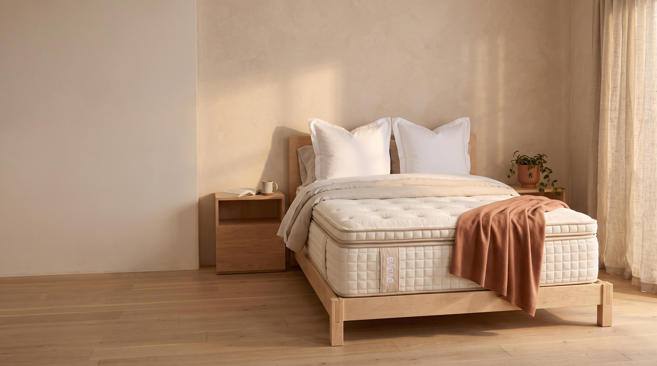 Evaya organic mattress in a warm, sunlit bedroom